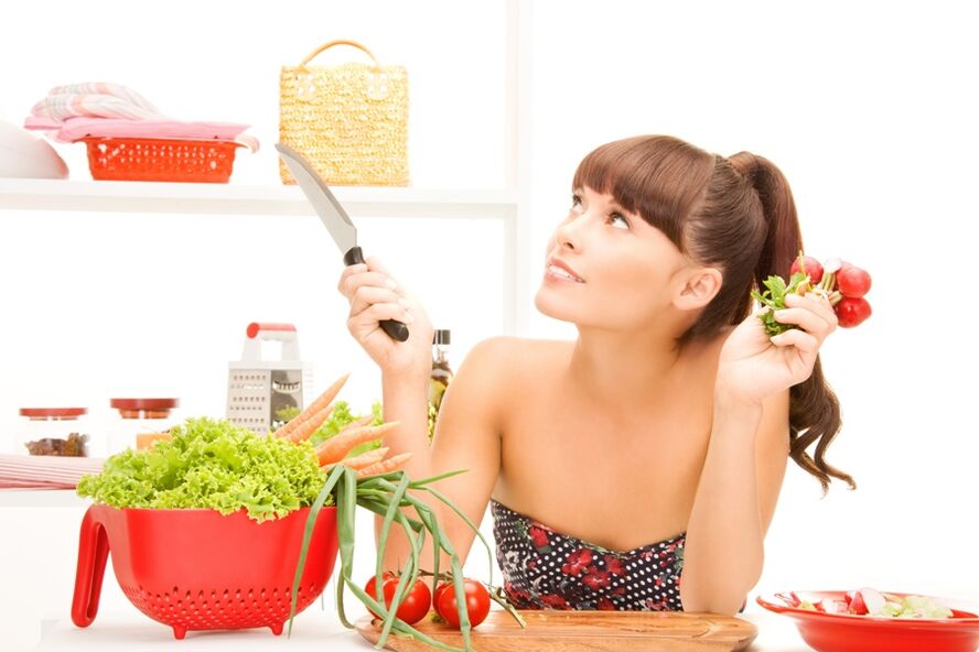 the girl prepares vegetables according to the 6-petal diet